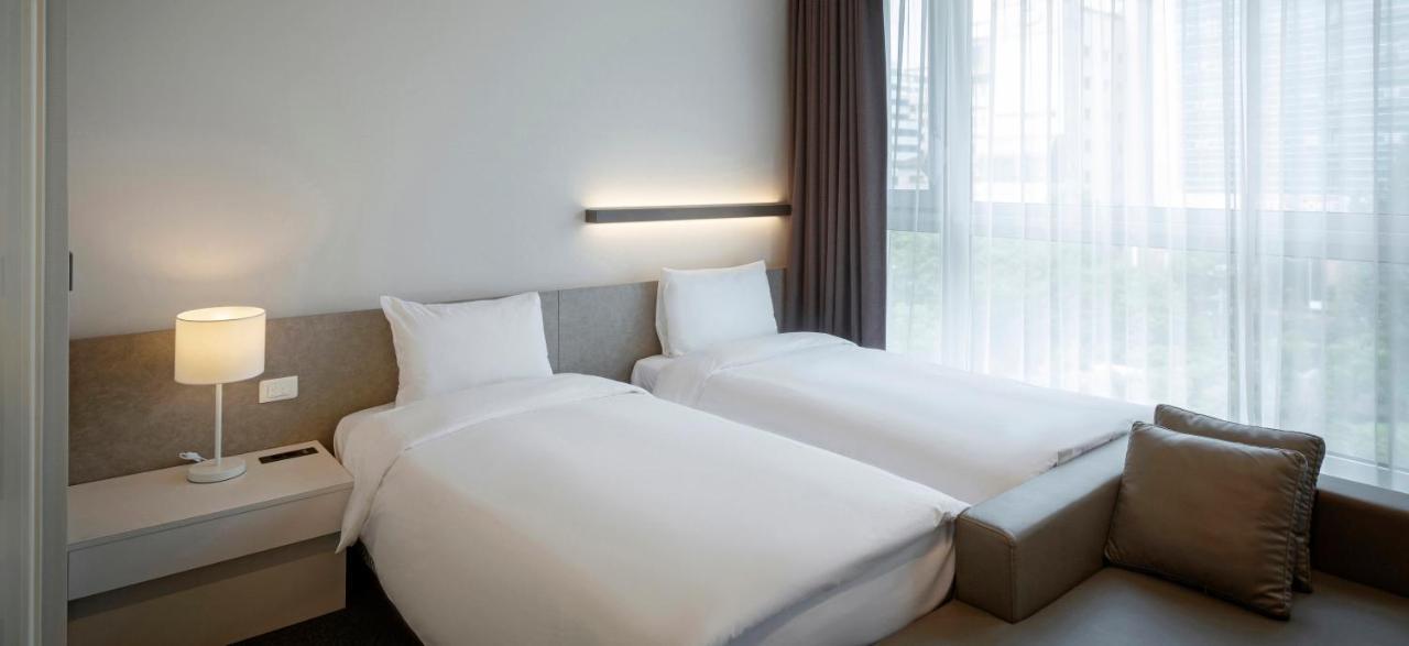 Grand City Hotel Чханвон Екстер'єр фото