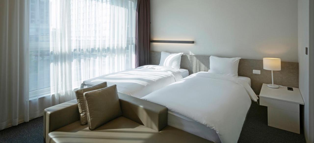 Grand City Hotel Чханвон Екстер'єр фото