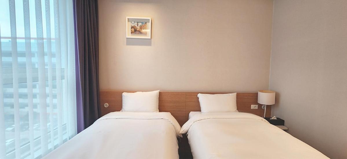 Grand City Hotel Чханвон Екстер'єр фото
